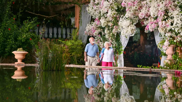 A couple strolls through the Vallarta Botanical Gardens.