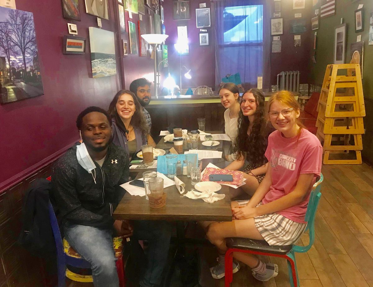 Mather High School Khan Ali, 19, of West Ridge, (left, back), is among students from Illinois who will participate in the global conversation on climate change at the 26th United Nations Summit on climate, which begins Sunday in Glasgow, Scotland.  Also pictured (left, front to back) Kierre Turner, Lily Aaron and (right, front to back) Charlotte Meyer, Jelena Collins and Sophie Ball.